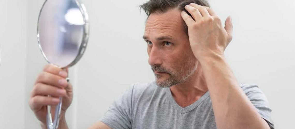 man-getting-hair-loss-treatment